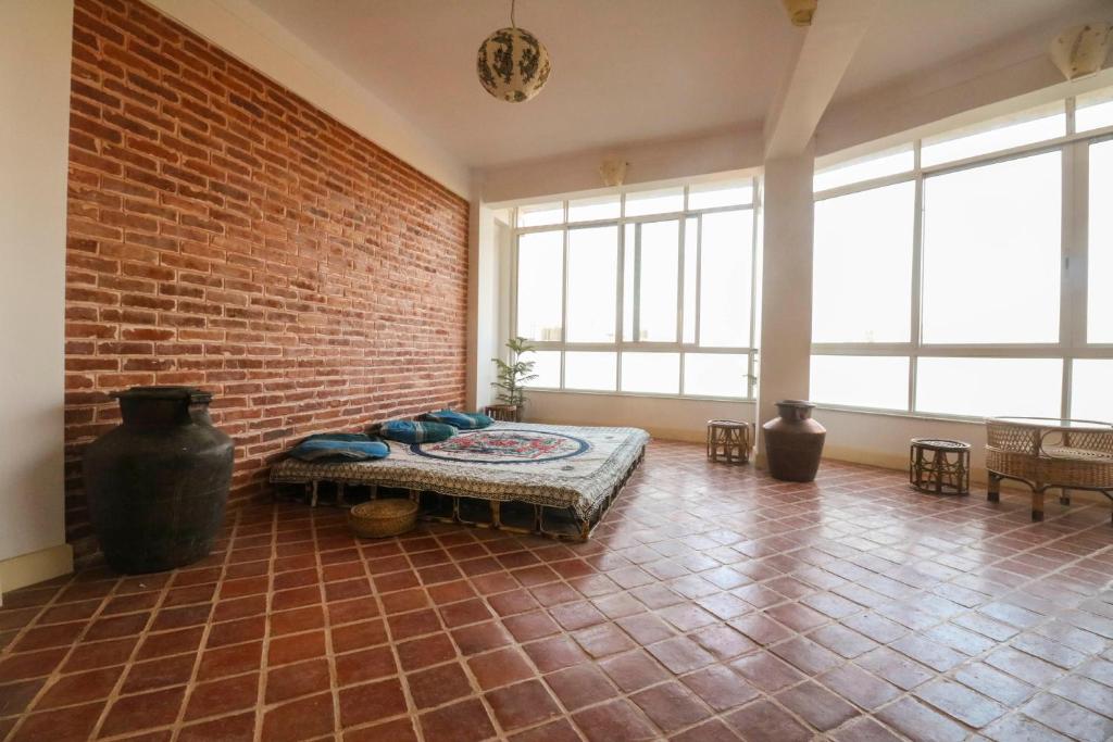 Postel nebo postele na pokoji v ubytování Chibha Classic Inn