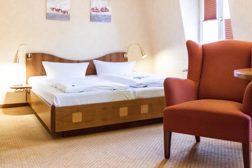 Postel nebo postele na pokoji v ubytování martas Hotel Albrechtshof Berlin