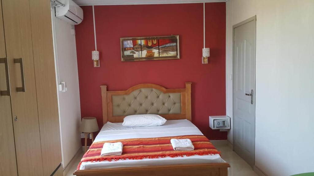 Postel nebo postele na pokoji v ubytování Krishangel Beach Apartment