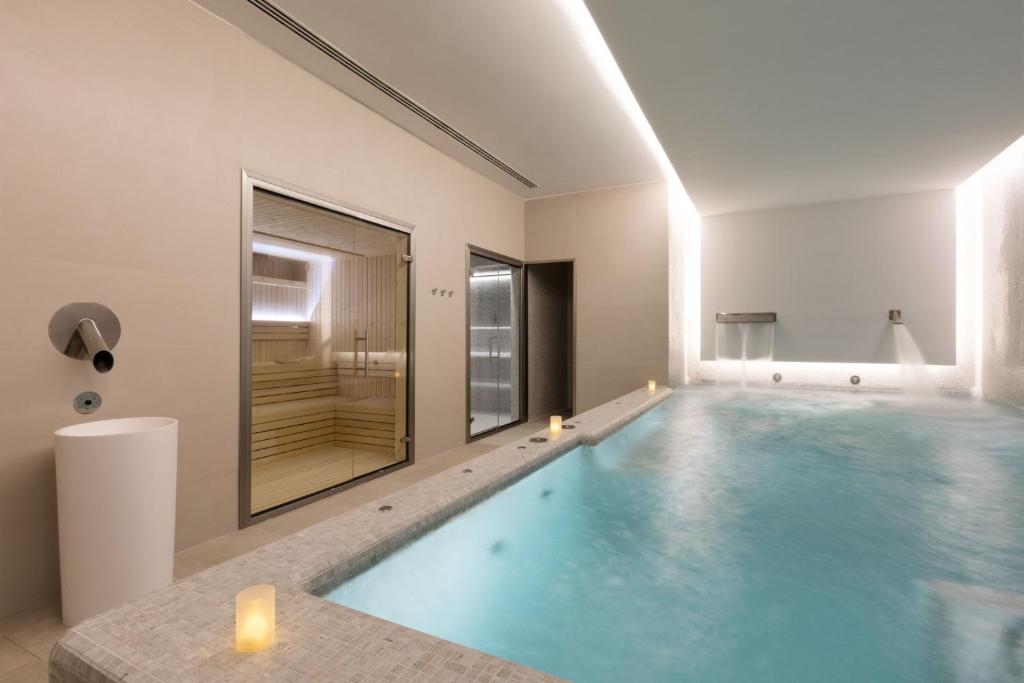 The swimming pool at or close to Bordoy Alcudia Port Suites - Adults Only
