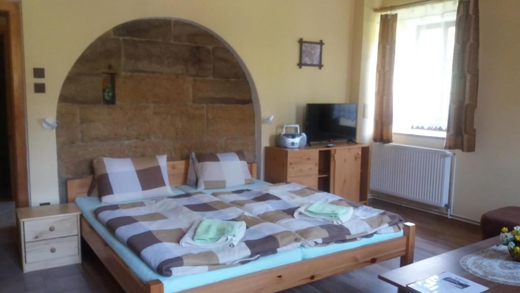 Postel nebo postele na pokoji v ubytování Ubytování U Potoka