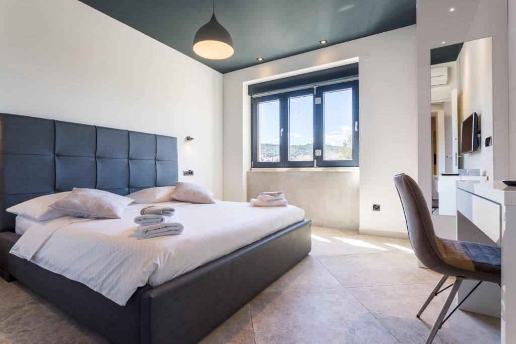 Posteľ alebo postele v izbe v ubytovaní New Apartment ParkView/CityView