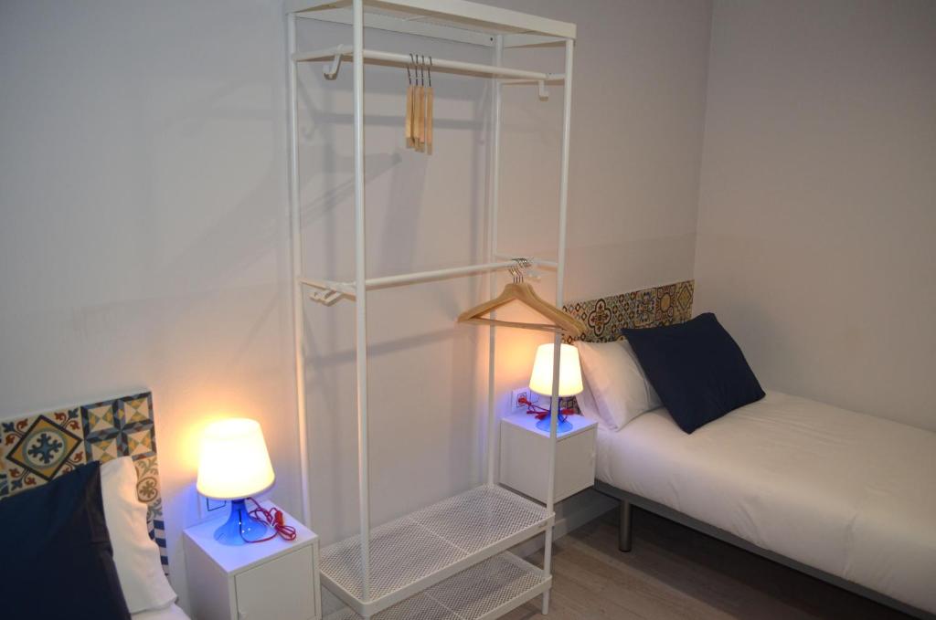 Postel nebo postele na pokoji v ubytování Poble Sec Apartments