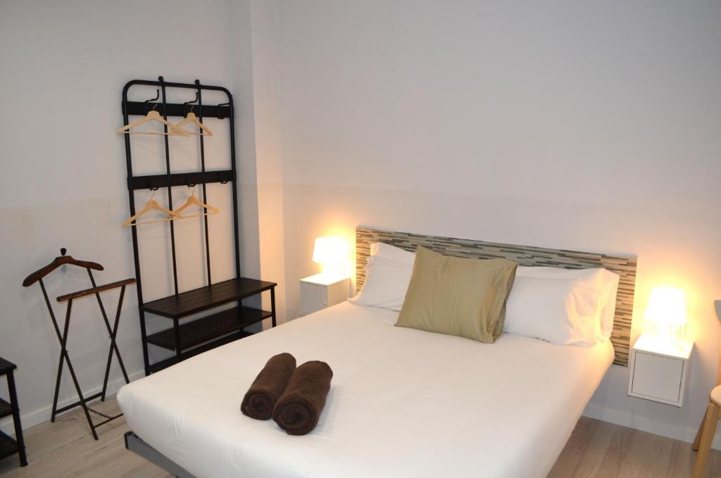 Postel nebo postele na pokoji v ubytování Poble Sec Apartments
