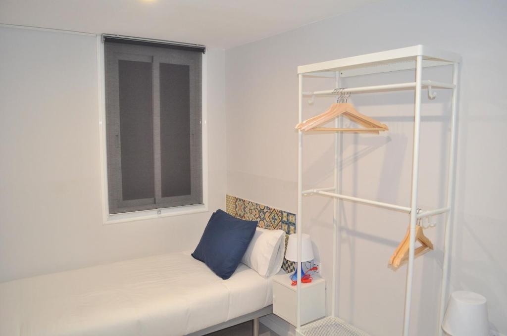 Postel nebo postele na pokoji v ubytování Poble Sec Apartments
