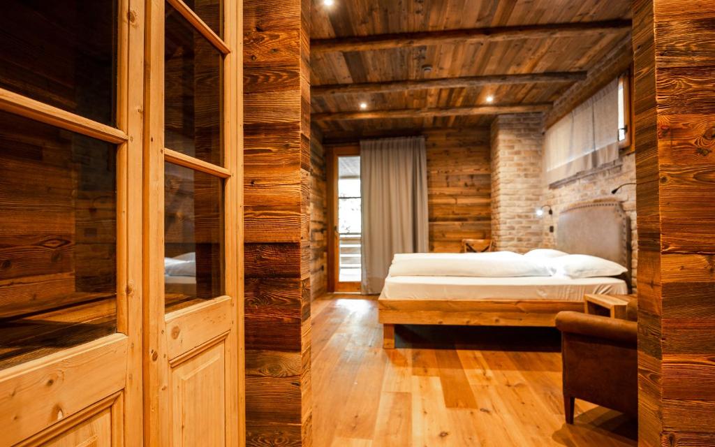 Postel nebo postele na pokoji v ubytování LMC Guesthouse