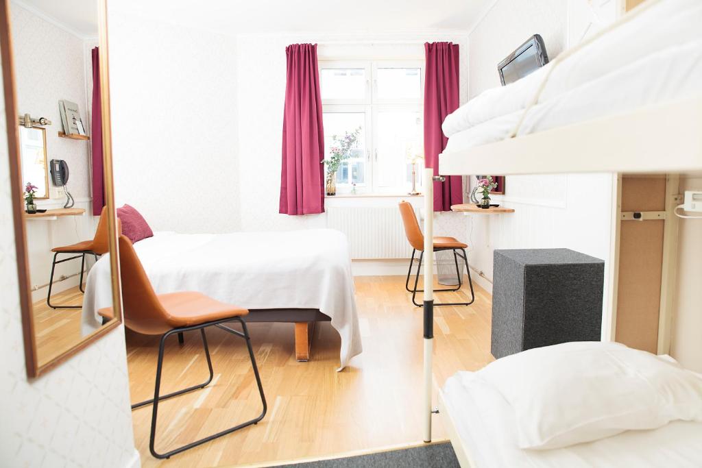 Postel nebo postele na pokoji v ubytování STF Hotel Zinkensdamm