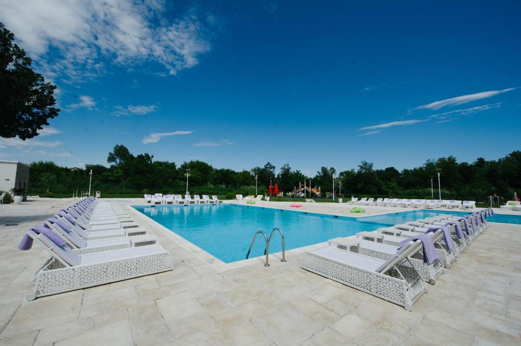 Bazén v ubytování Hotel Melodia nebo v jeho okolí