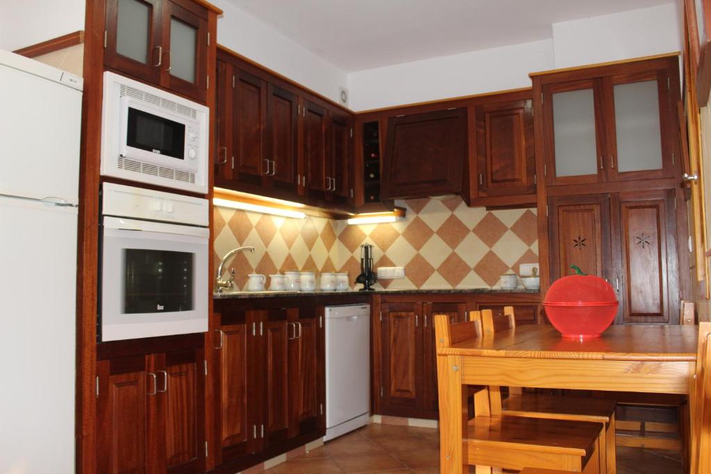 Kuchyň nebo kuchyňský kout v ubytování Villa Moll