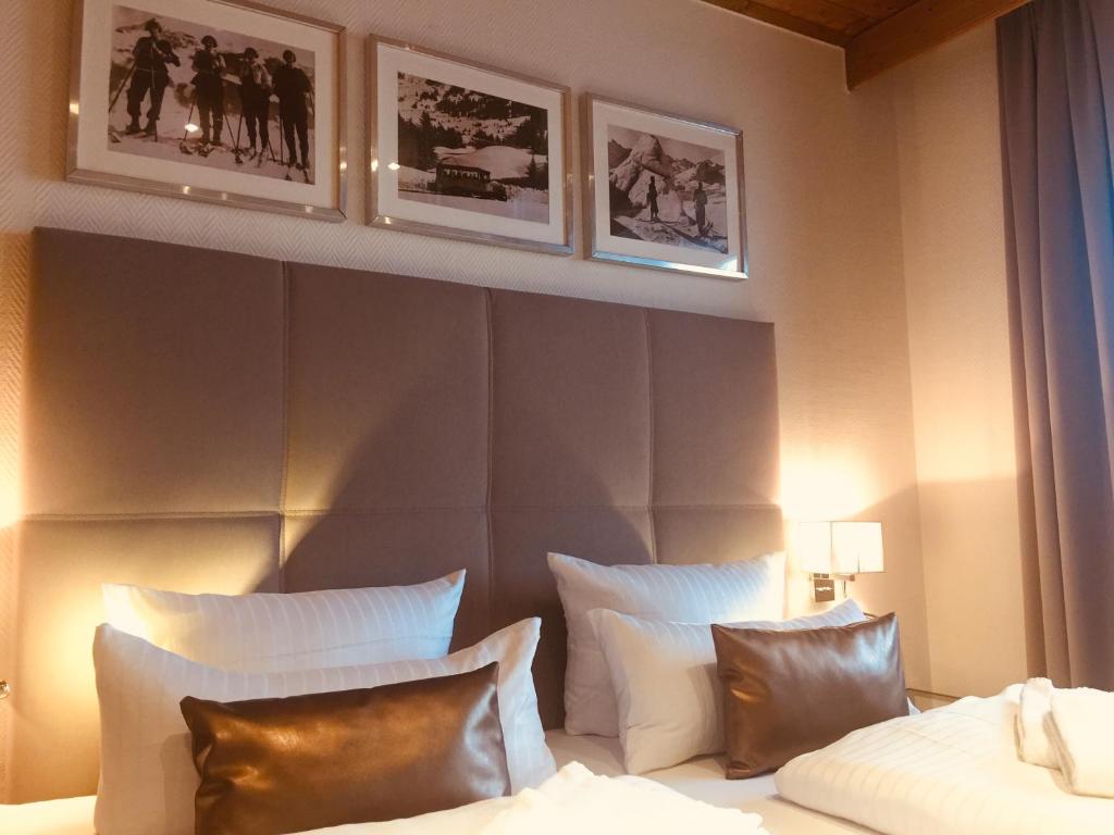 Postel nebo postele na pokoji v ubytování Hotel Strasser