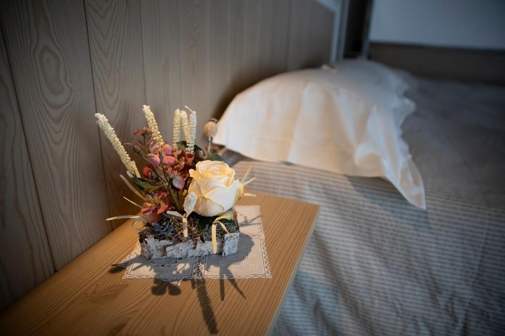 Posteľ alebo postele v izbe v ubytovaní Hotel Laghetto