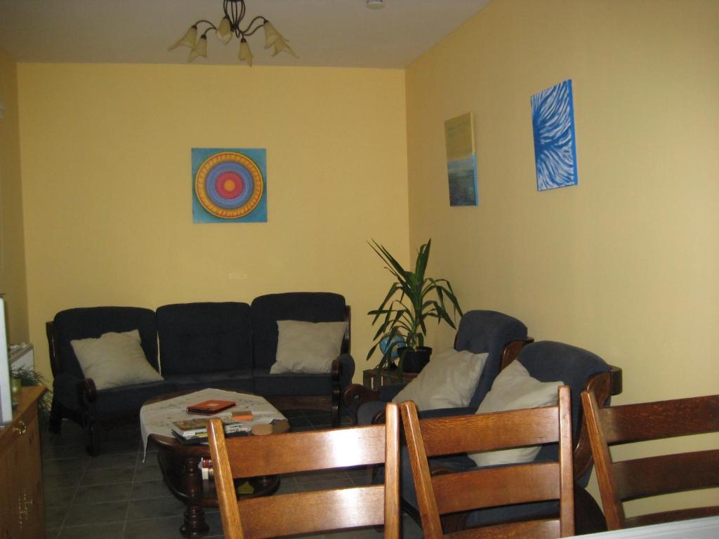 Posezení v ubytování B&B Het Uilennest