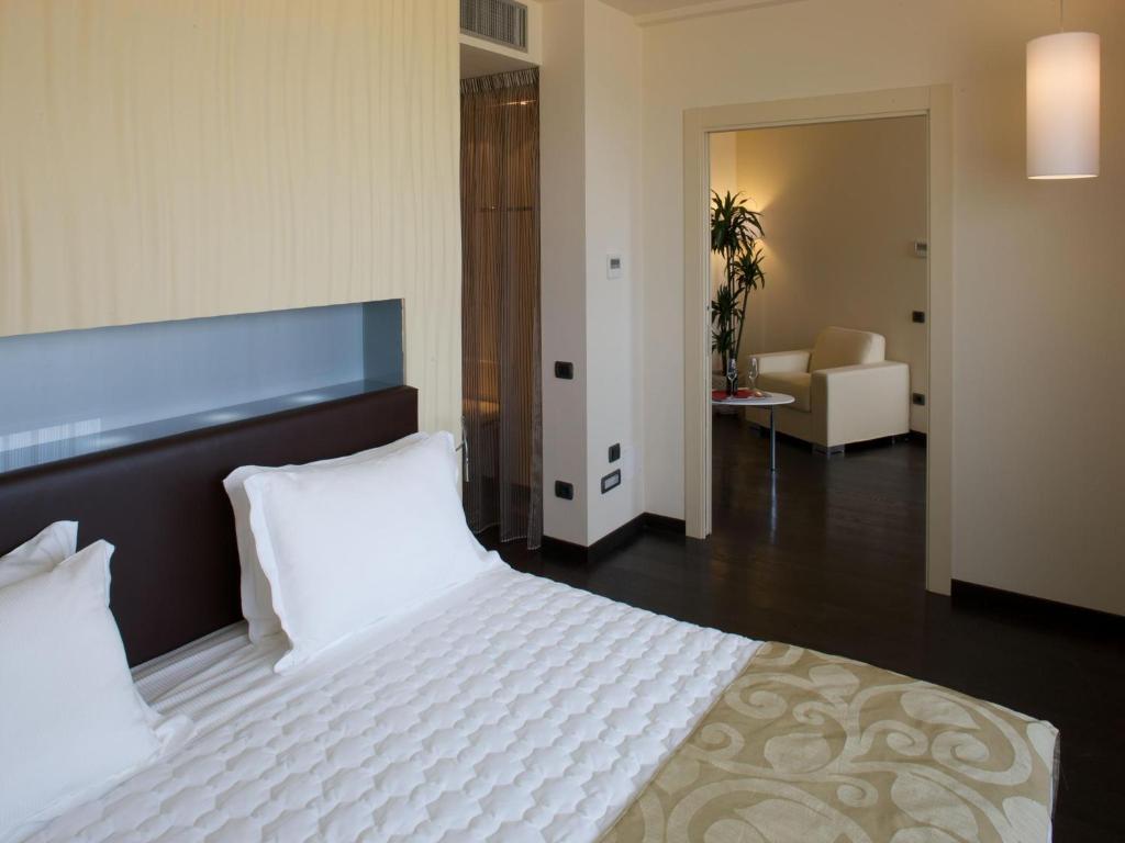 Posteľ alebo postele v izbe v ubytovaní Grand Hotel Mattei