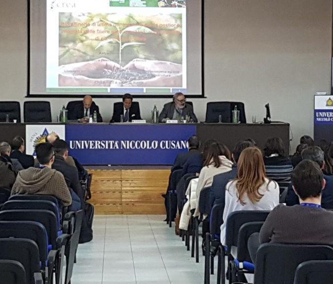 a group of people sitting at a meeting in a room at Green house 2018 in Rome