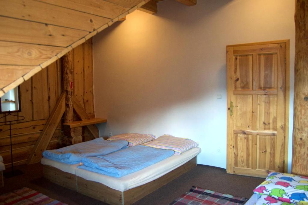 Postel nebo postele na pokoji v ubytování Chata Koliba