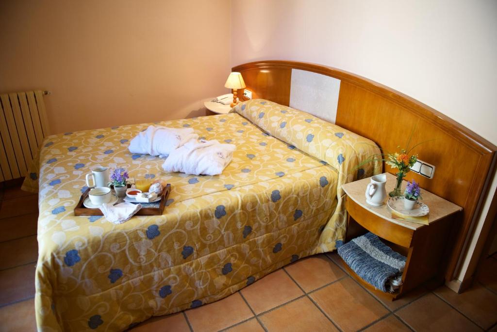 Postel nebo postele na pokoji v ubytování Hotel Rural Jaumet