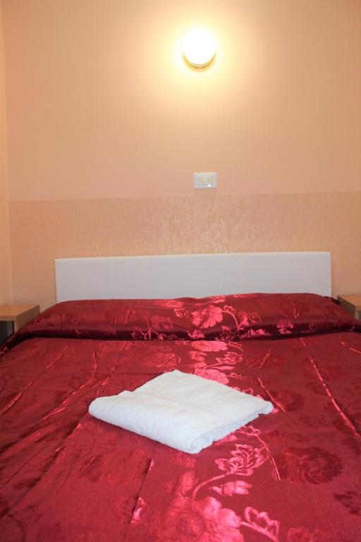 Postel nebo postele na pokoji v ubytování Hotel Eurorooms