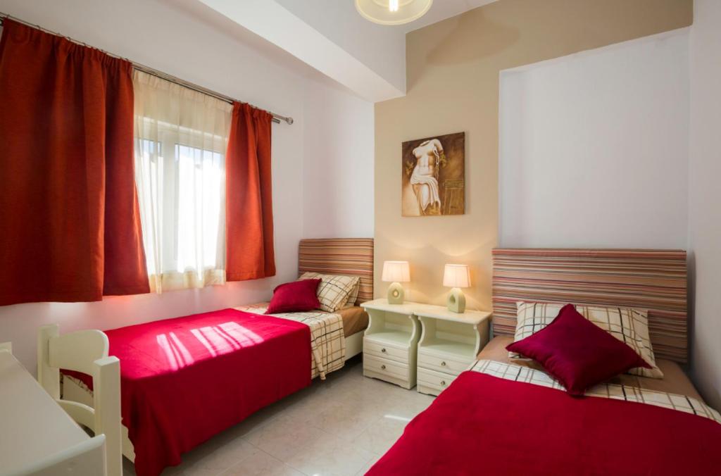 Łóżko lub łóżka w pokoju w obiekcie Green Apartments