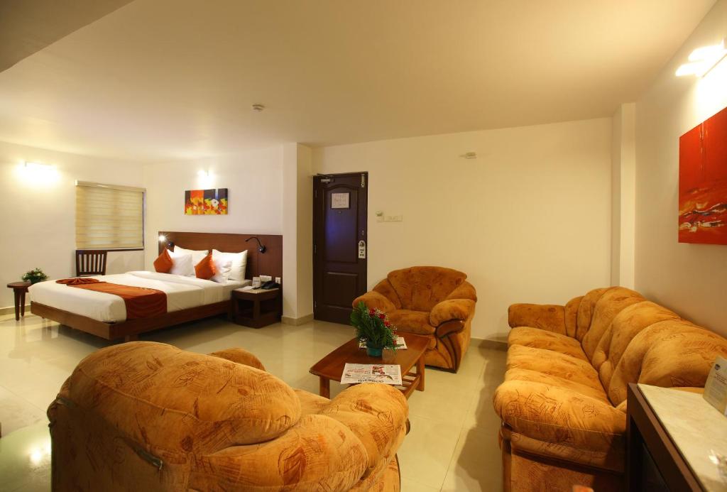 Postel nebo postele na pokoji v ubytování Park Residency Luxury Business Hotel