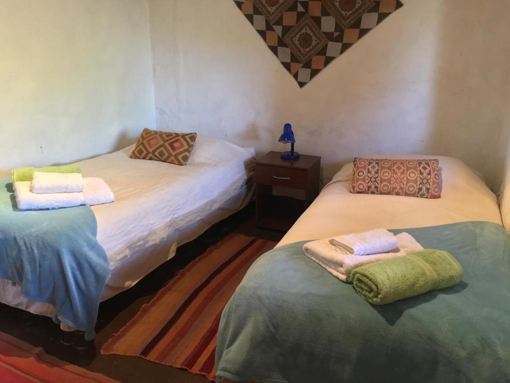 Postel nebo postele na pokoji v ubytování Atacama Loft & Glamp