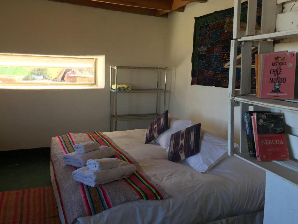 Postel nebo postele na pokoji v ubytování Atacama Loft & Glamp