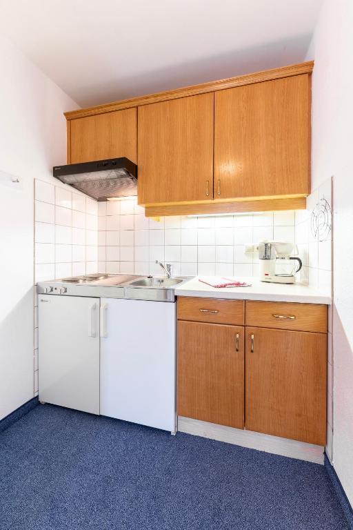 Kuchyň nebo kuchyňský kout v ubytování Frühstückspension-Appartementhaus Wasserer