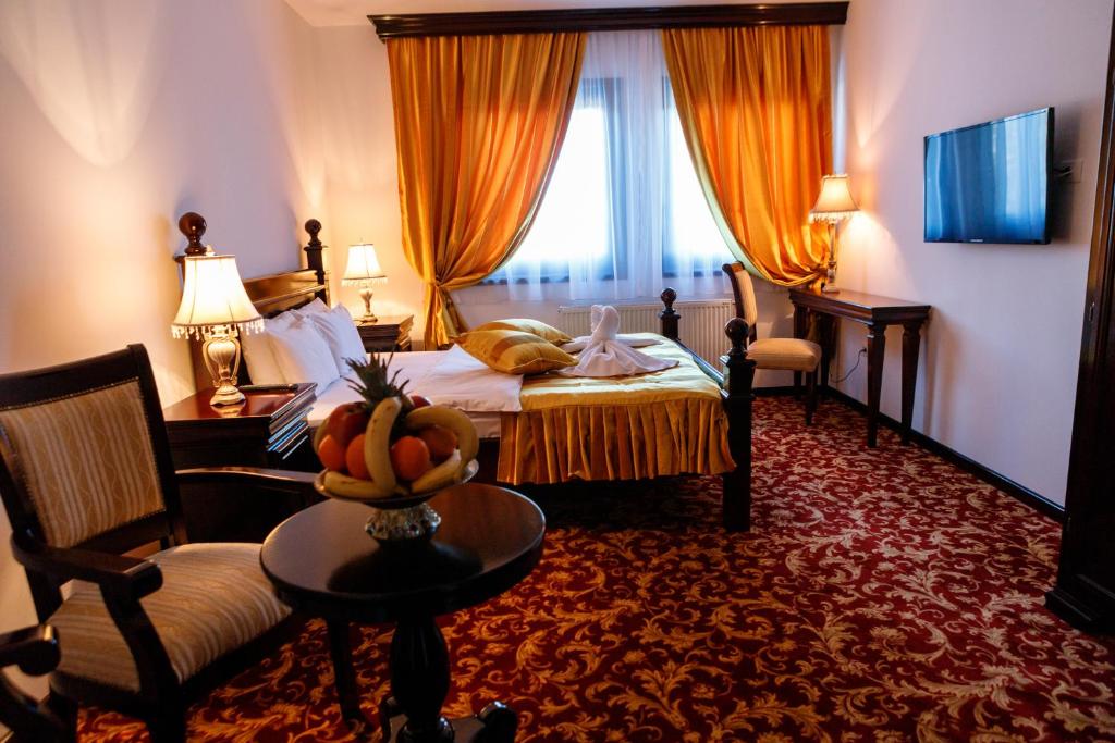Postel nebo postele na pokoji v ubytování Hotel Zlatarski Zlatnik