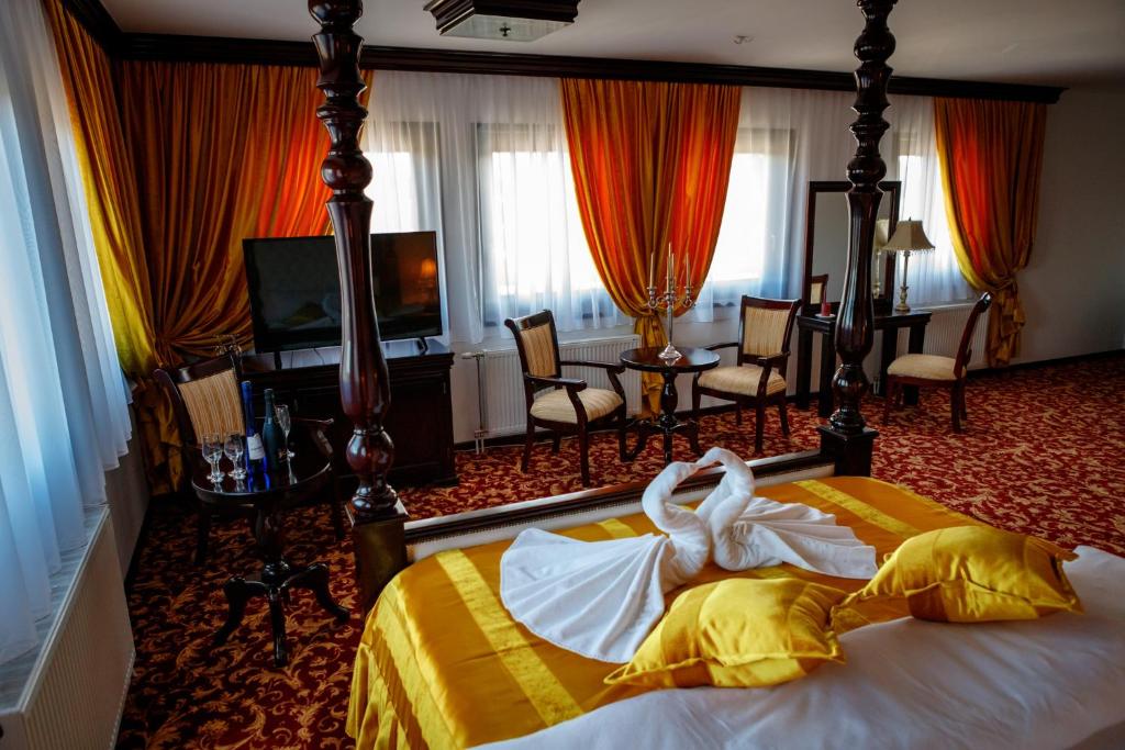 Postel nebo postele na pokoji v ubytování Hotel Zlatarski Zlatnik