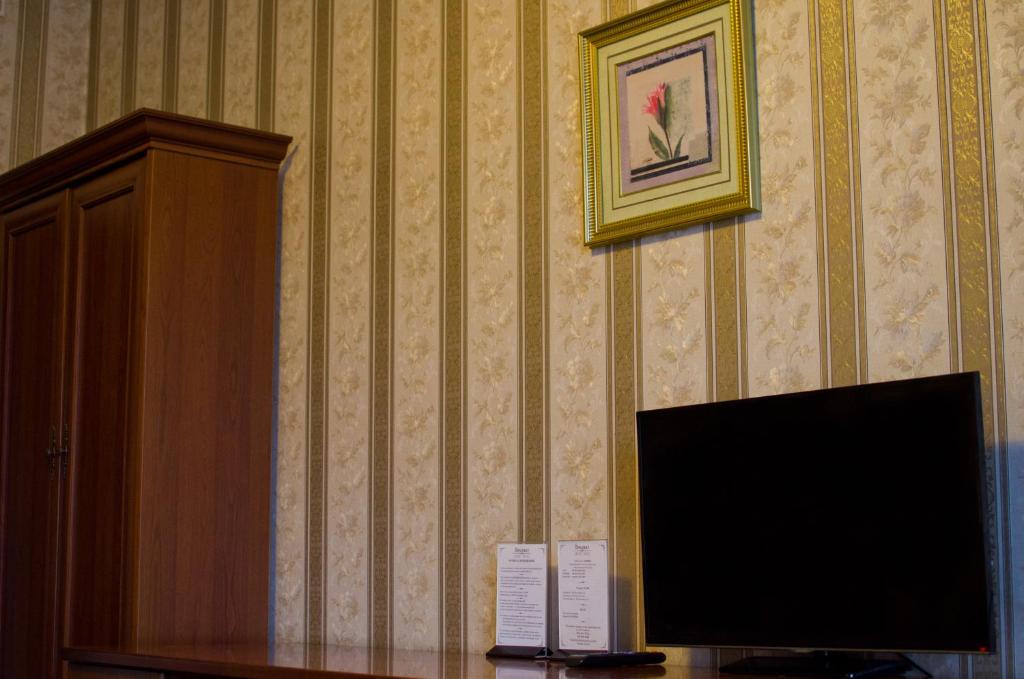 TV a/nebo společenská místnost v ubytování Diplomat ApartHotel