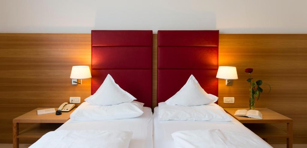 Postel nebo postele na pokoji v ubytování Hotel Kolping