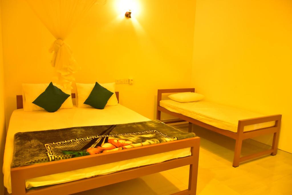 Postel nebo postele na pokoji v ubytování Little Ele Safari Lodge