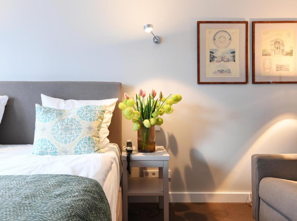 Postel nebo postele na pokoji v ubytování Hotel Admiral