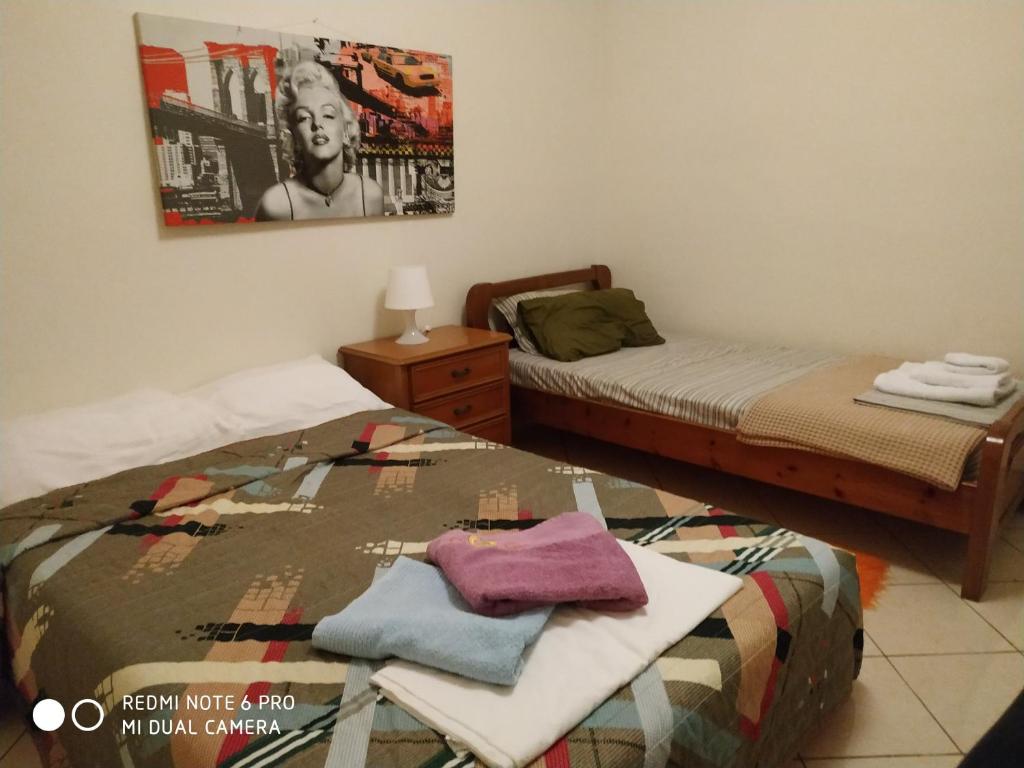 Posteľ alebo postele v izbe v ubytovaní Stavros Apartments