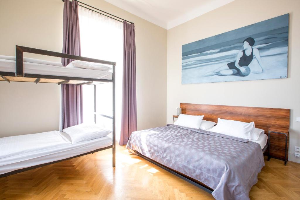 Postel nebo postele na pokoji v ubytování Sophie's Hostel