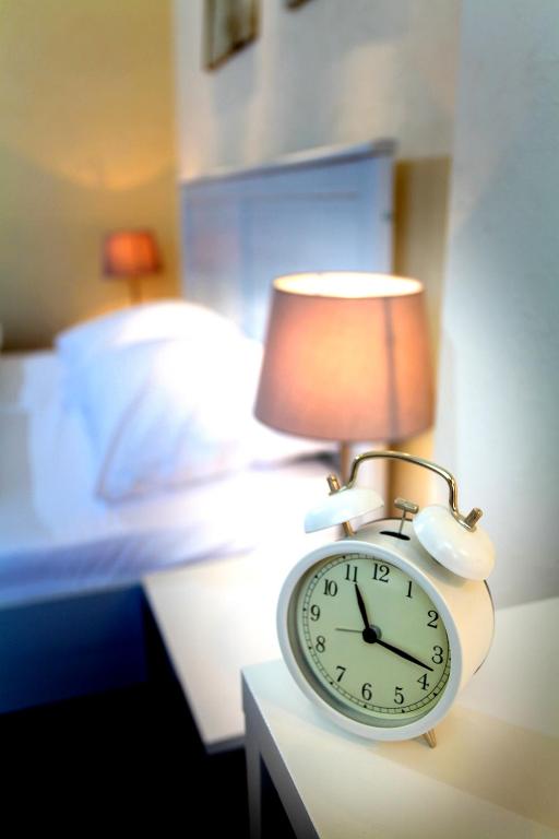 Postel nebo postele na pokoji v ubytování Hotel Fresena im Dammtorpalais