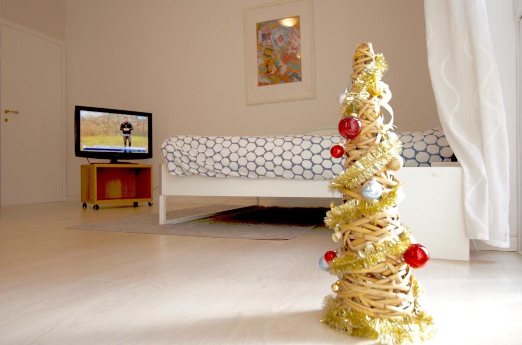 Telewizja i/lub zestaw kina domowego w obiekcie Interno 77 di TSS' - Appartamento soleggiato con Ampie Finestre & Internet Veloce con Fibra - Perfetto per Coppie