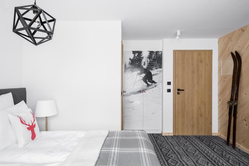 Postel nebo postele na pokoji v ubytování Villa Górska Ski & Bike