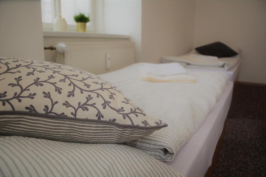 Postel nebo postele na pokoji v ubytování Apartmány Karina