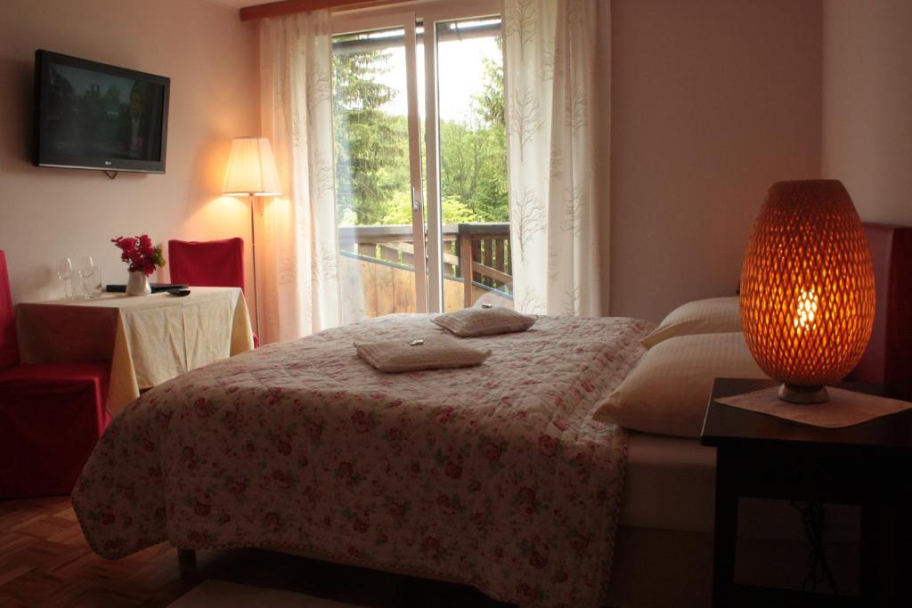 Postel nebo postele na pokoji v ubytování Hotel und Freizeitanlage Rauch-Hof