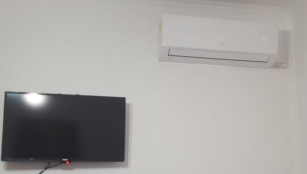 TV a/nebo společenská místnost v ubytování Apartment Geart