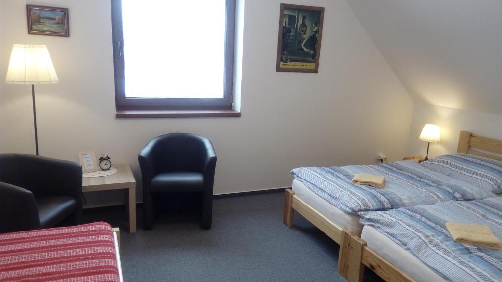 Postel nebo postele na pokoji v ubytování Rekreace Zelba
