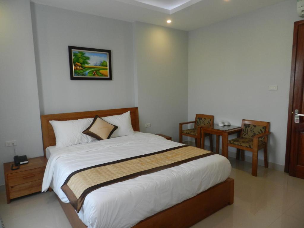 Postel nebo postele na pokoji v ubytování Green Hotel