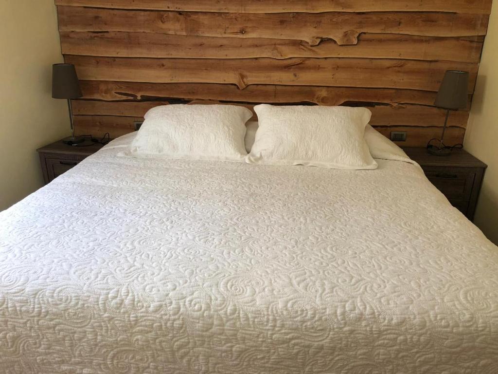 Uma cama ou camas num quarto em Cabanas Senderos Puyuhuapi