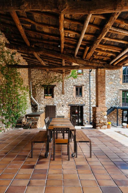 Patio alebo iná vonkajšia časť ubytovania Cal Pesolet Eco Turisme Rural