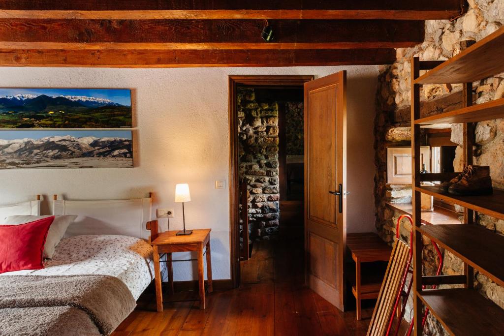 Posteľ alebo postele v izbe v ubytovaní Cal Pesolet Eco Turisme Rural