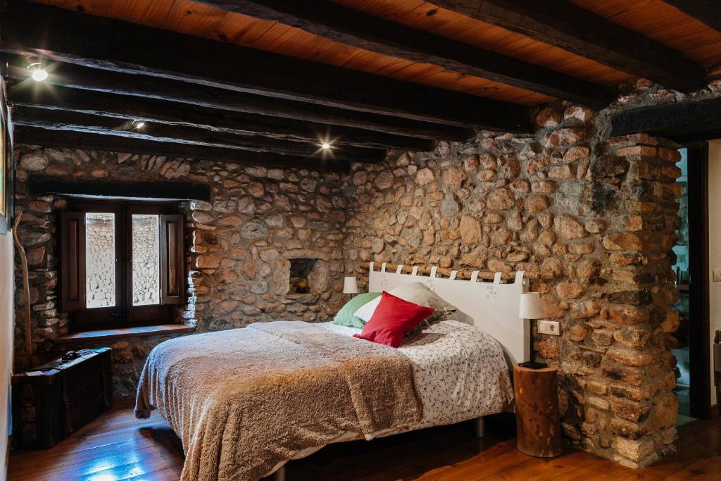 Posteľ alebo postele v izbe v ubytovaní Cal Pesolet Eco Turisme Rural