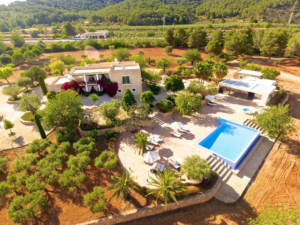 an aerial view of a house with a swimming pool at Can Vicent Rafal in Santa Eularia des Riu