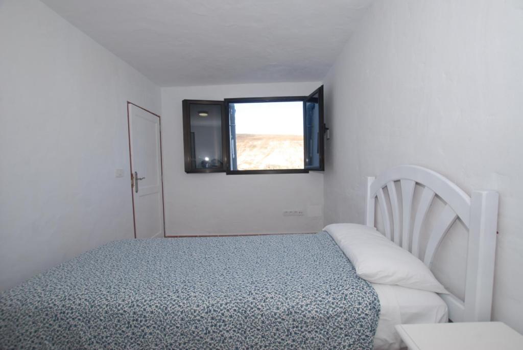 Posteľ alebo postele v izbe v ubytovaní Apartamento PANCHO