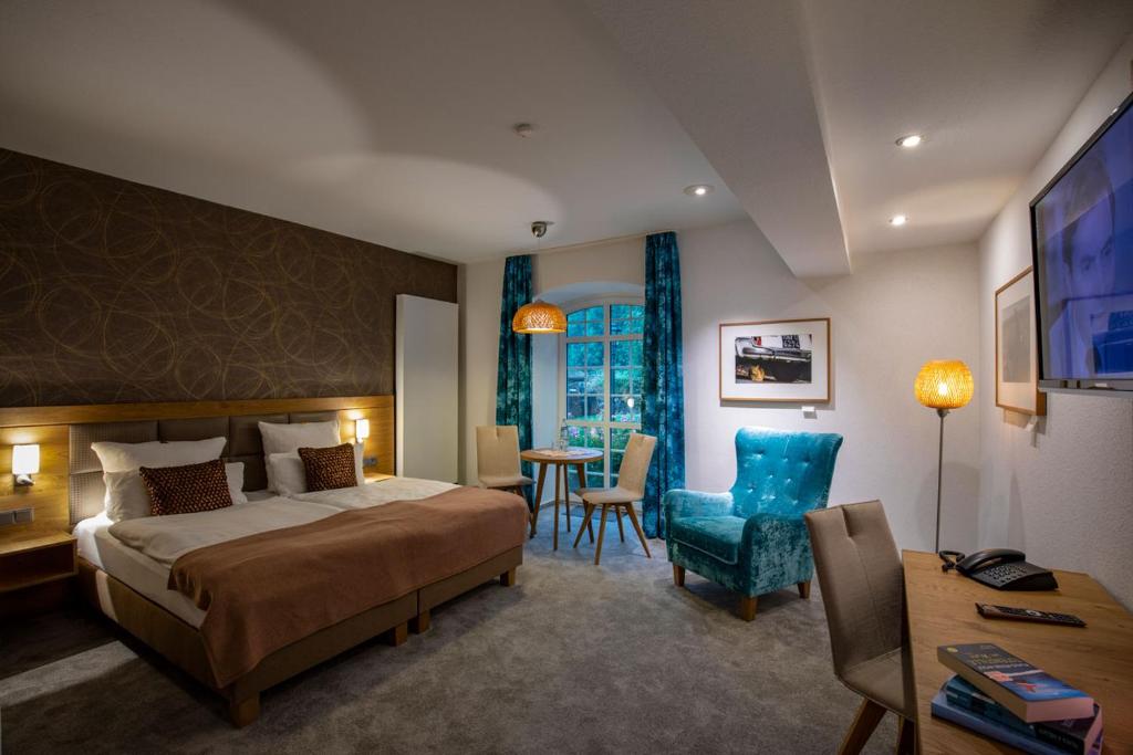 Postel nebo postele na pokoji v ubytování Hotel Haus Recke