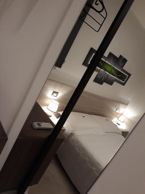 Postel nebo postele na pokoji v ubytování Cuoreverde Matera